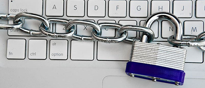 Computer Keyboard with Padlock and Chain